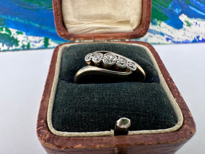 18ct Gold 5 European cut Diamond Cross over ring