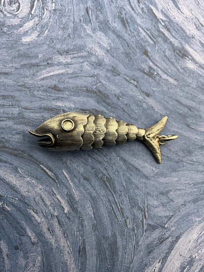 Silver articulated fish charm