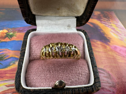 Antique 18ct Claw set Graduating Diamond ring, 1915