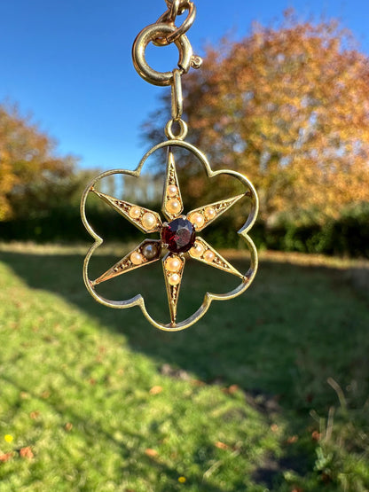 Edwardian 15ct gold garnet & seed pearl open work pendant