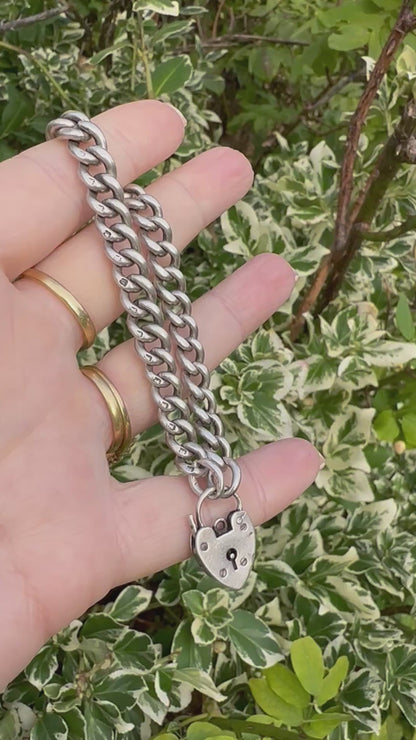 Antique Sterling silver graduated curb bracelet with vintage heart padlock clasp