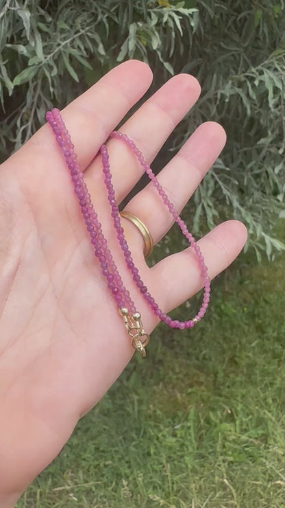 Ruby & Pink tourmaline half and half mini beads with antique 9ct gold bolt clasp and central bead.
