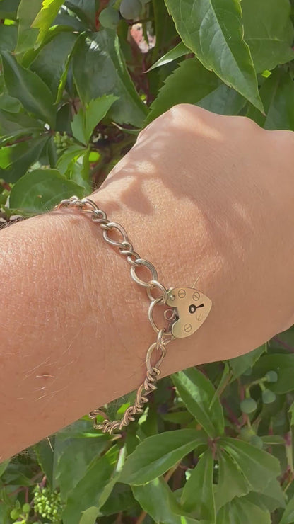 Vintage 9ct Gold Curb and Twist link bracelet with heart padlock