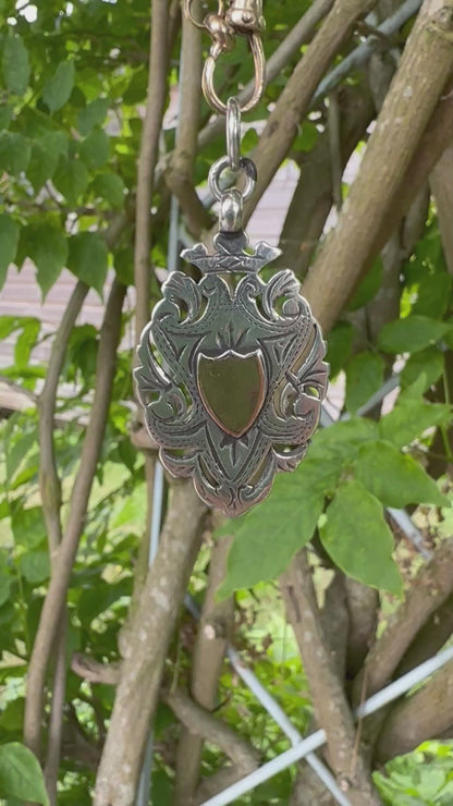 Antique Sterling silver Shield fob with rose gold centre