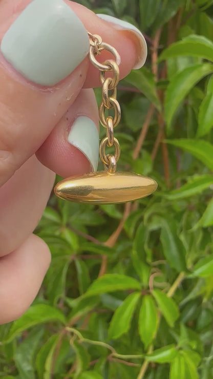 Antique 10ct gold Torpedo pendant