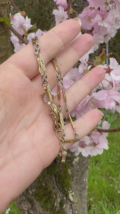 Antique 9ct bi-colour bar and lovers knot Albert chain with floating t-bar, dog clip and bolt clasp