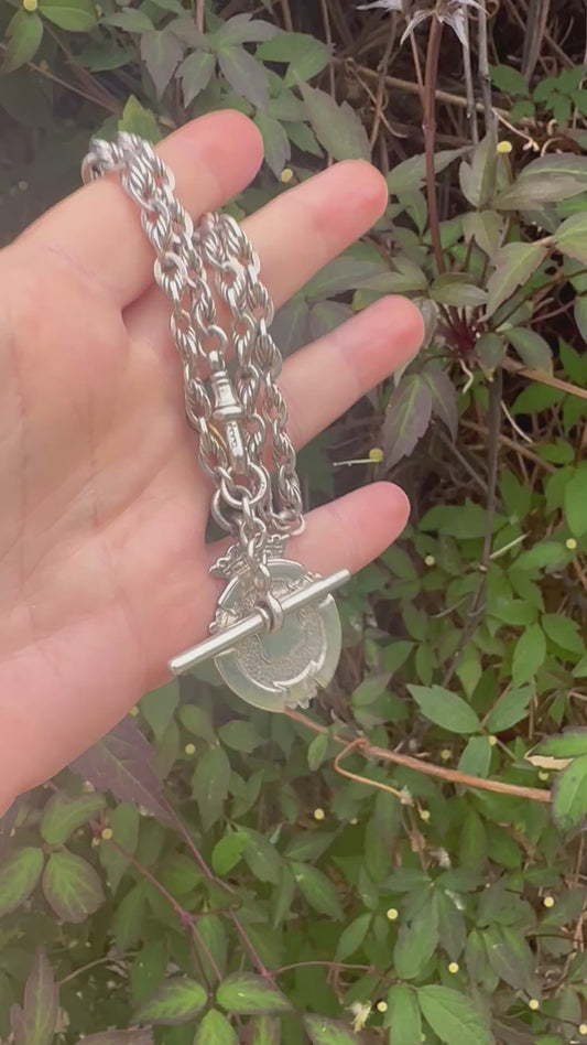 Sterling Silver Lovers Knot Albert chain, with T-bar, dogclip and shield fob.