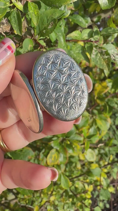 Sterling Silver Star patterned oval locket